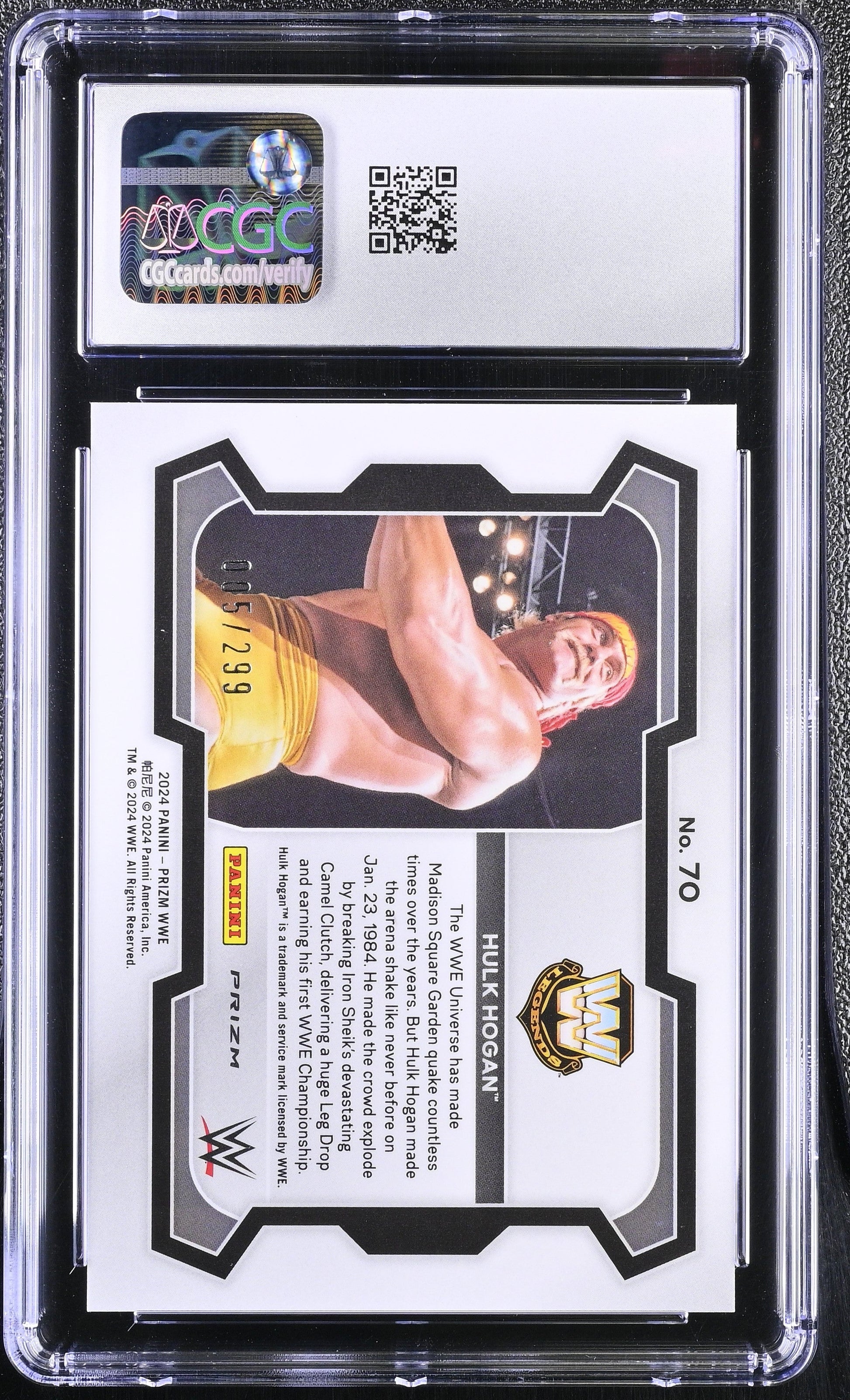Wrestling trading card with a player's image and details, encased in protective packaging.