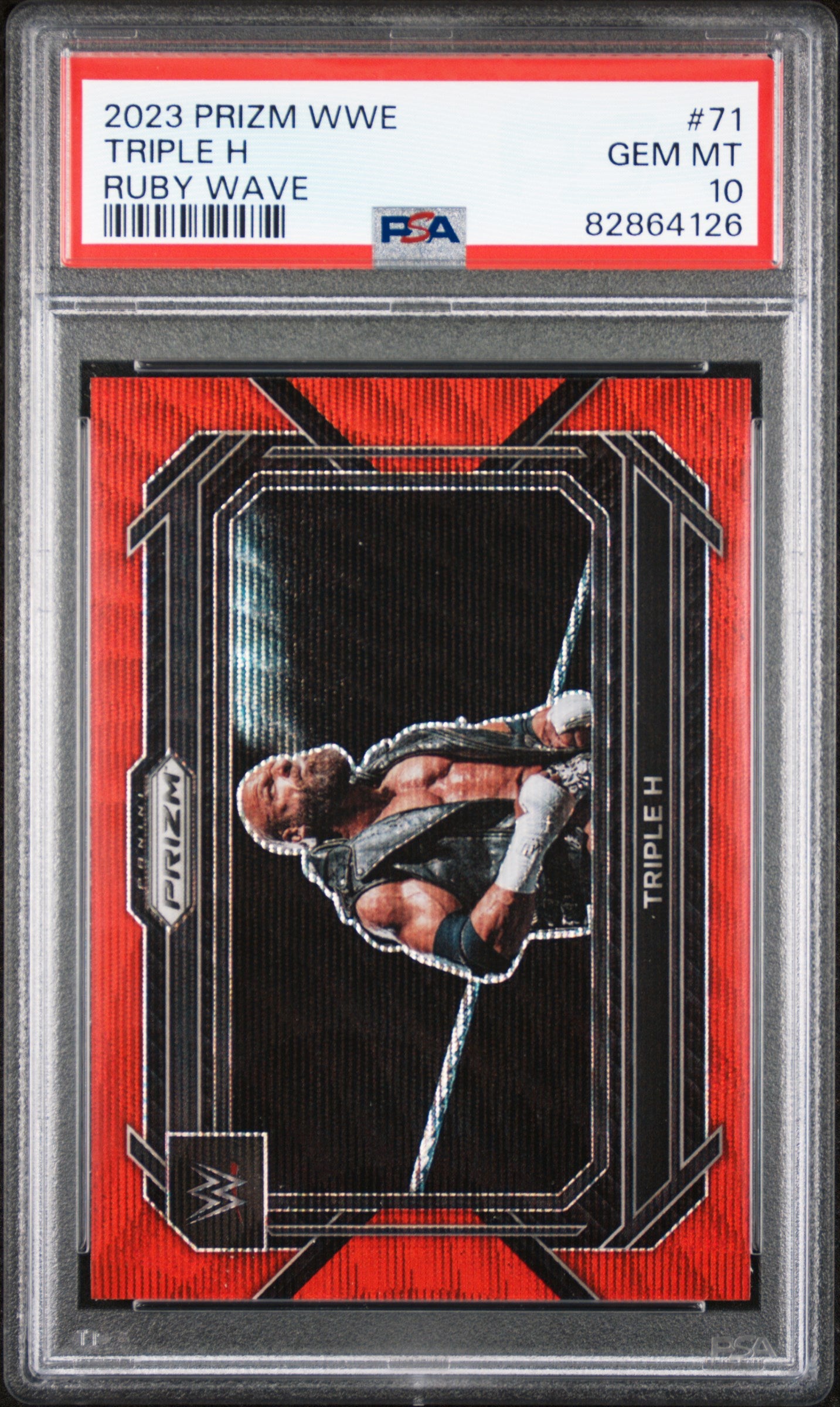 Trading card of Triple H from 2023 Prizm WWE series, graded Gem Mint 10 by PSA.