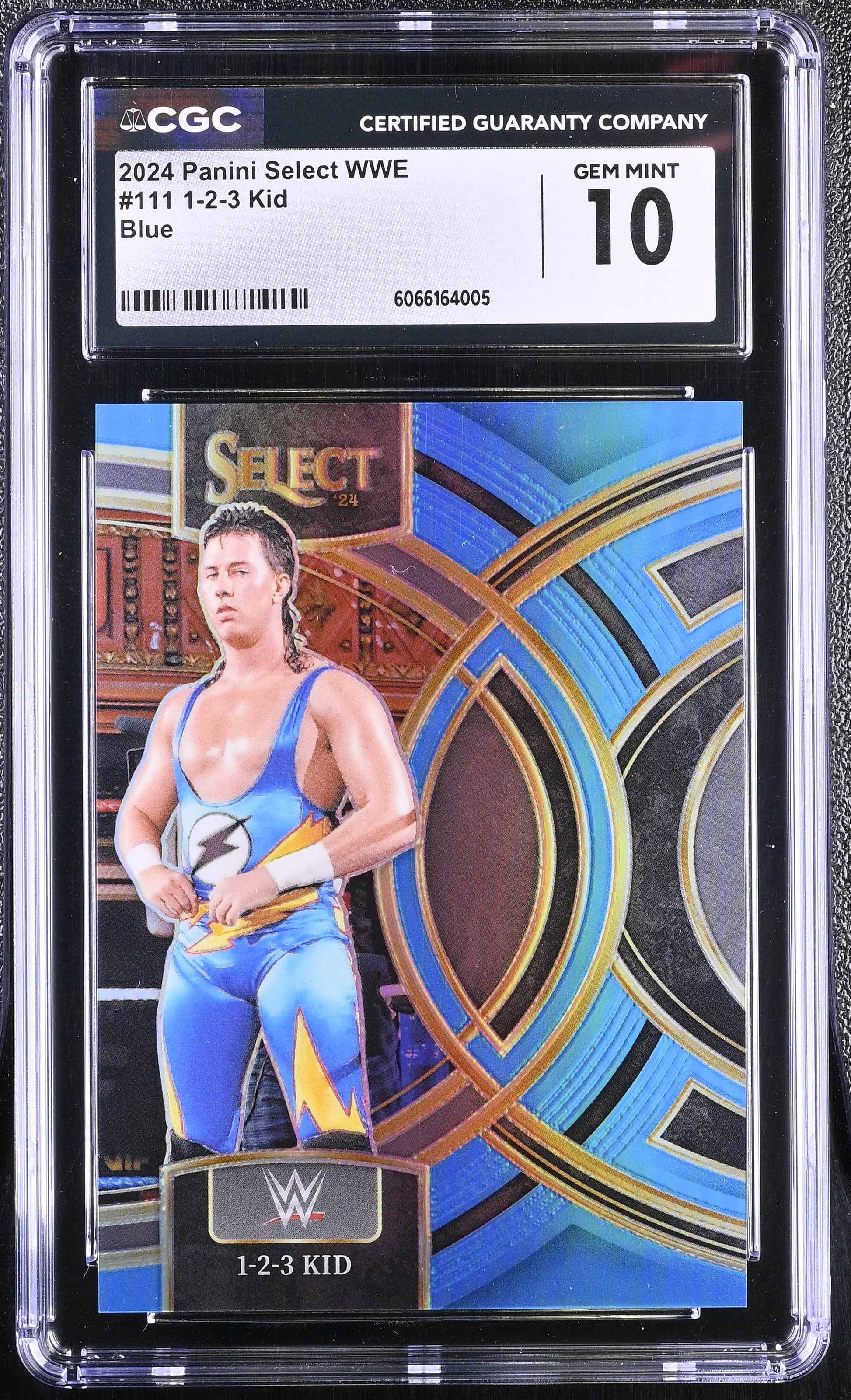 WWE trading card in a CGC protective case with a blue and gold design.